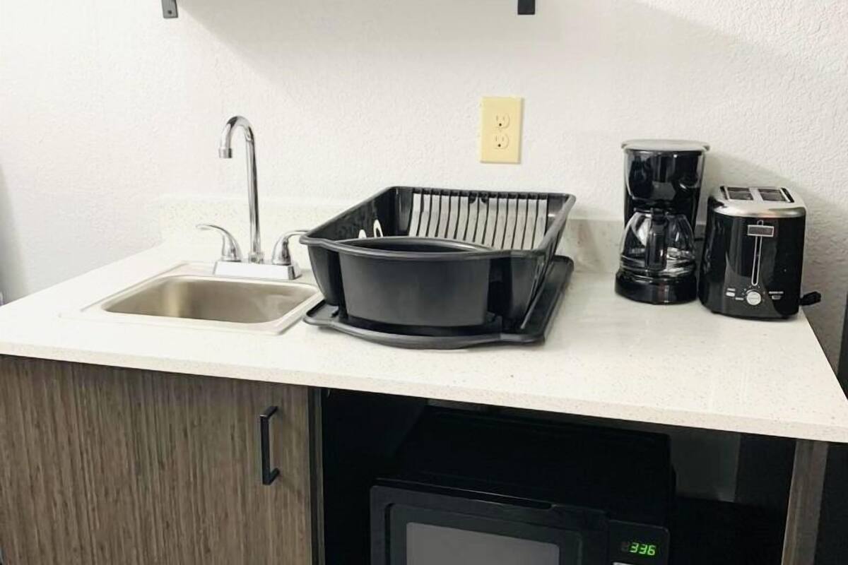 full-sized fridge, microwave, coffee/tea maker, toaster