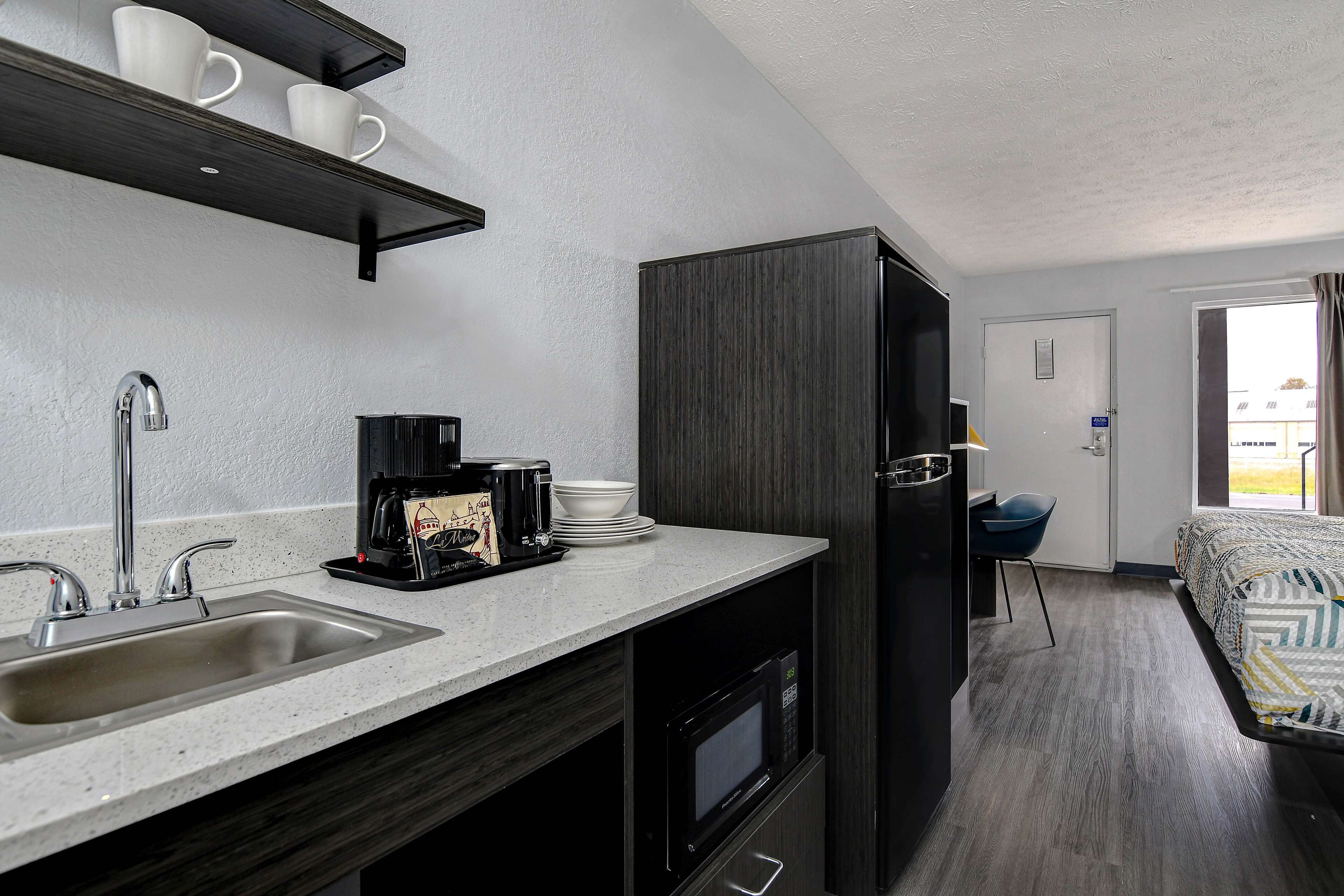 full-sized fridge, microwave, coffee/tea maker, toaster