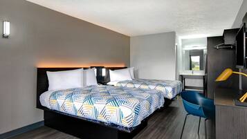 Premium bedding, desk, laptop workspace, blackout curtains