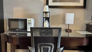 Desk, laptop workspace, blackout drapes, iron/ironing board