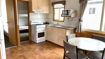 Economy 2 Bedroom Cabin | Private kitchen | Shared fridge, microwave, oven, stovetop