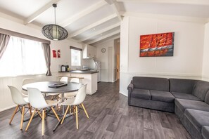 Superior Balcony 3 Bedroom Villa | Living area | TV - Geelong Holiday Park (Belmont)
