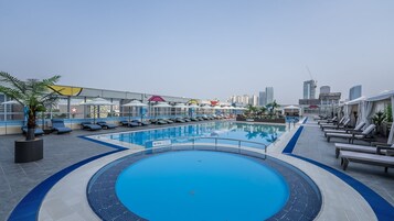 Seasonal outdoor pool, pool cabanas (surcharge), pool umbrellas