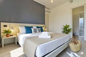 2 slaapkamers, een strijkplank/strijkijzer, gratis wifi, beddengoed