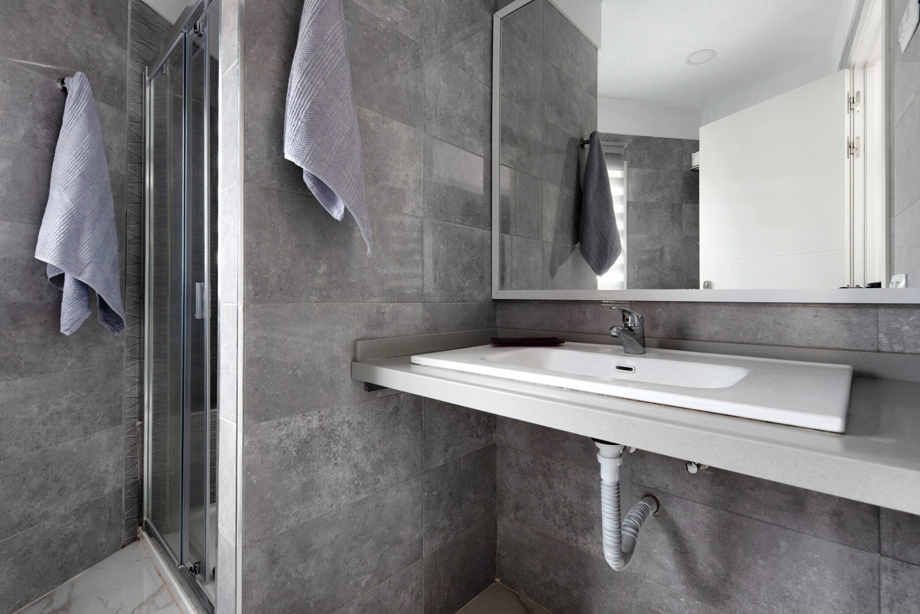 Shower, free toiletries, hair dryer, towels