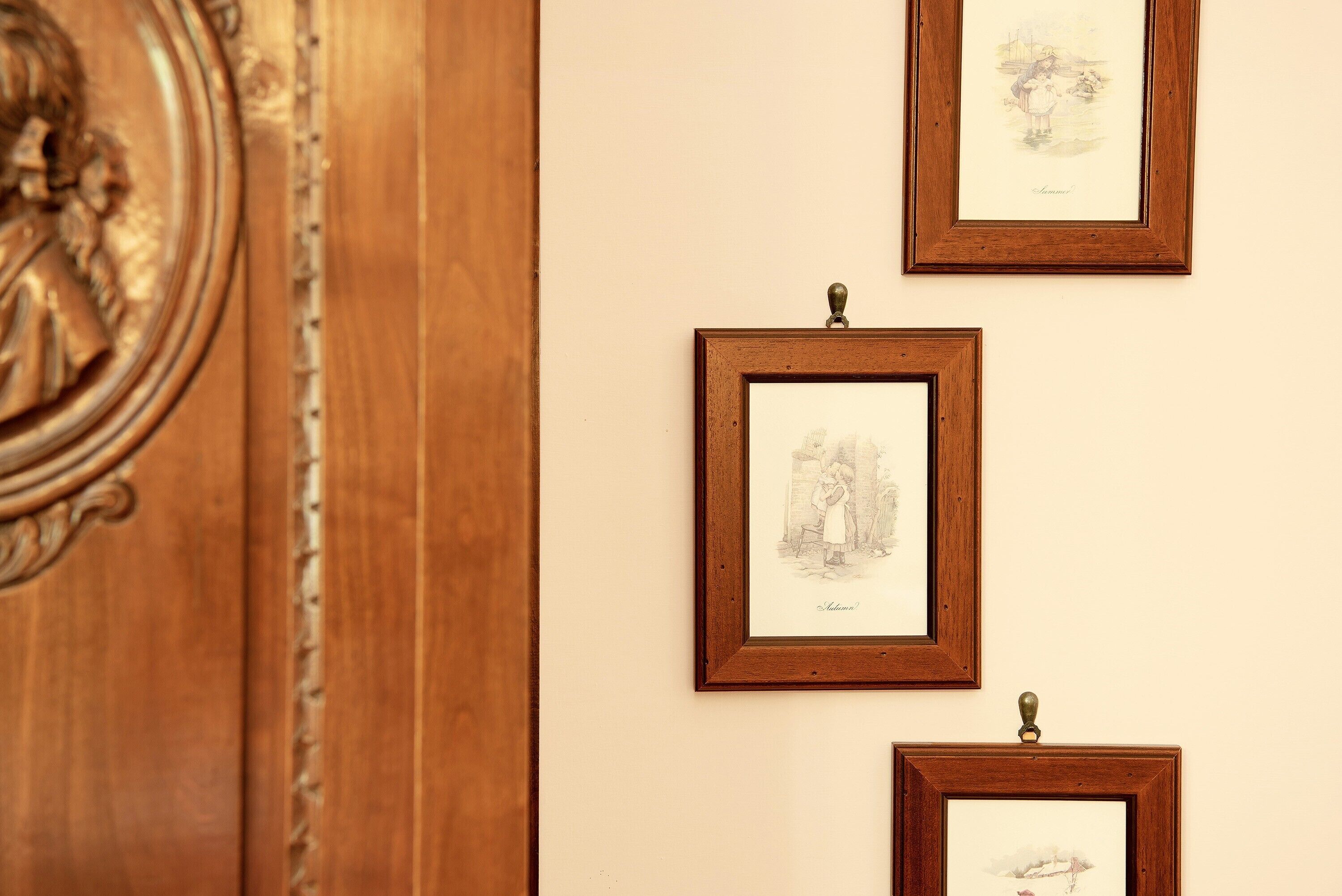 Framed artwork on a wall.
