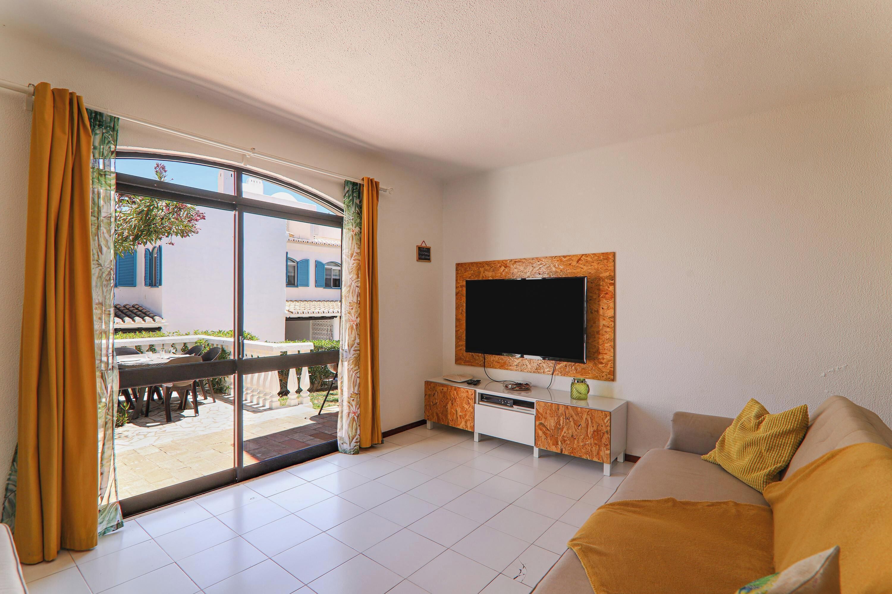 Flat-screen TV, fireplace