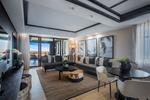 Standard Apartment | Living area | 55-inch Smart TV with satellite channels, TV, Netflix - The Capital Zimbali (Ballito)