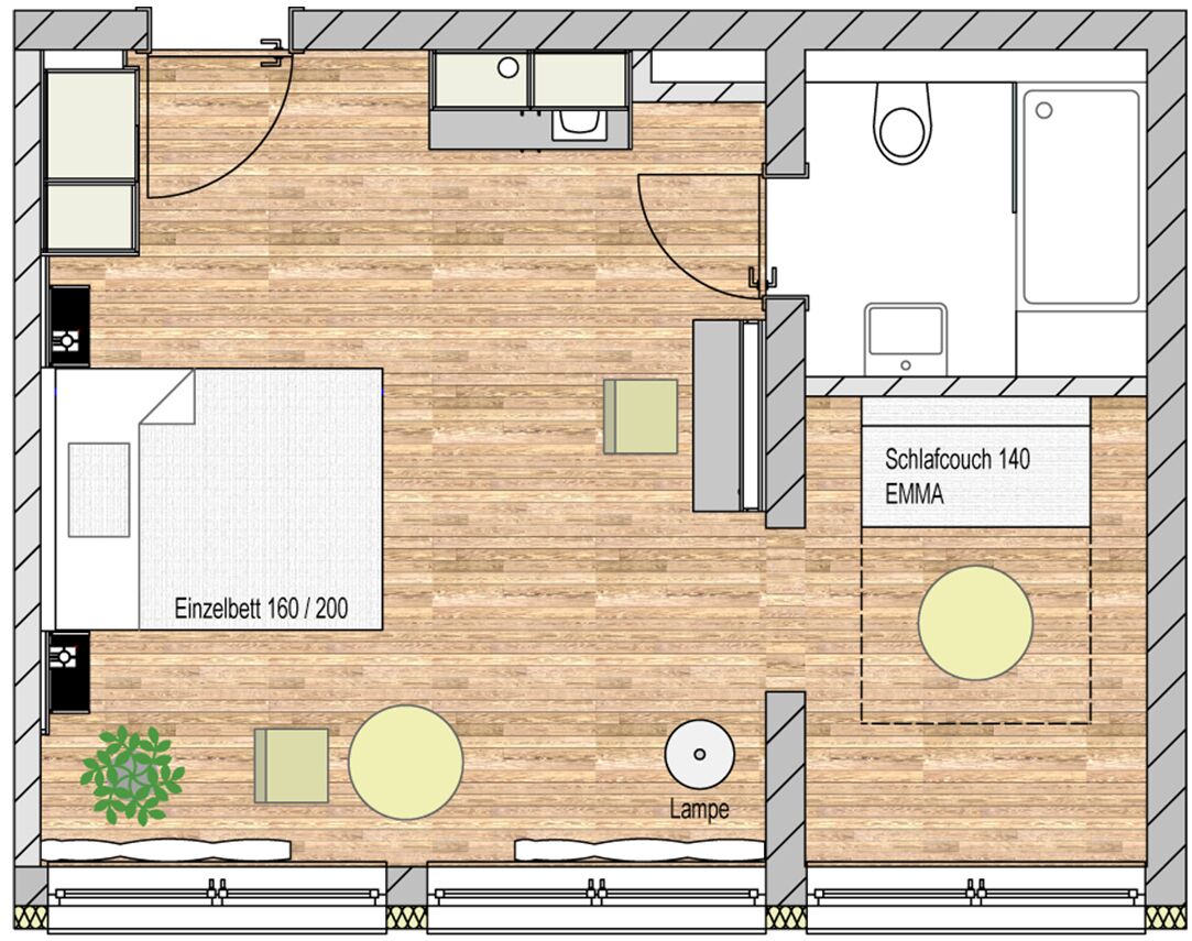 A hotel room layout with a bed, kitchenette, bathroom, and a small seating area.
