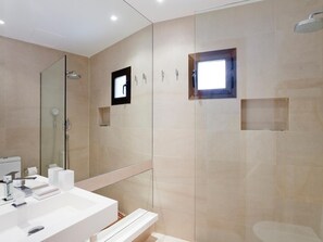 Shower, hair dryer, towels, soap
