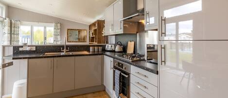 Appartement Luxe, salle de bains privée, vue jardin | Cuisine partagée
