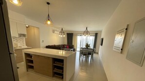 Appartamento Elite | Area soggiorno | TV a schermo piatto