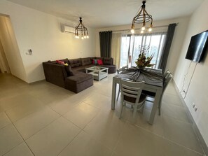 Elite Apartment | Living area | Flat-screen TV - Marassi North Coast 2 Bedroom pool View (El Alamein)