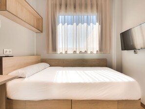 Escriptori, espai de treball apte per a portàtils i wifi gratuïta 