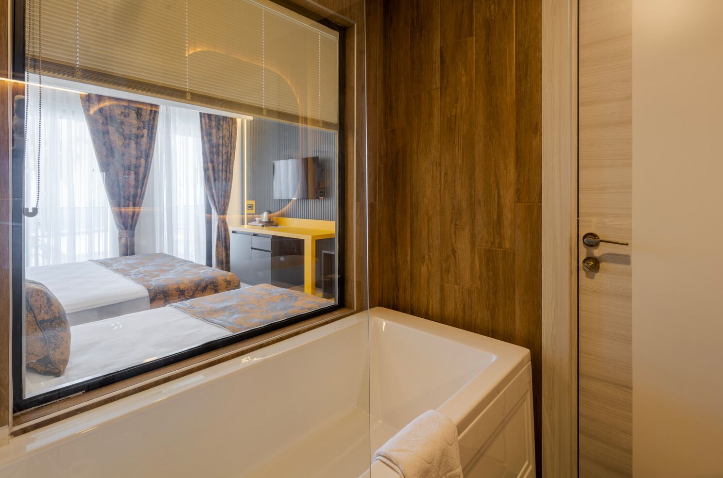 deluxe room, 2 bedrooms, pool view | bathroom | rainfall showerhead, hair dryer, slippers, towels