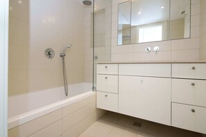 Shower, hair dryer, towels