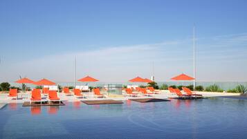 Outdoor pool, open 8:00 AM to 5:00 PM, pool umbrellas, pool loungers