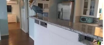 Beach and river view cottage with deck and specatuclar views.