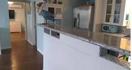 Beach and river view cottage with deck and specatuclar views.