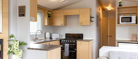 Mobile Home Familial, salle de bains privée, vue jardin (Luxury Static Caravan) | Cuisine partagée