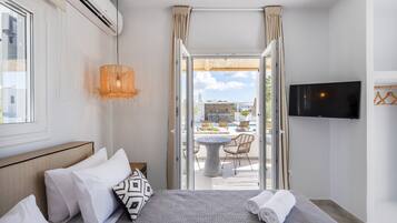 Suite Studio Junior, 1 grand lit, bain à remous | Literie de qualité supérieure, coffres-forts dans les chambres