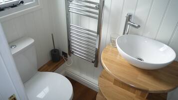 Cabin (Airlie Shepherds Hut) | Bathroom | Shower, hair dryer, towels