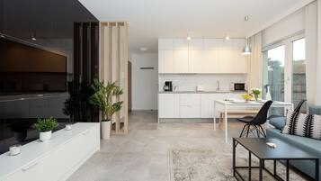 Apartment, 1 Schlafzimmer, Balkon, am Strand | Wohnzimmer