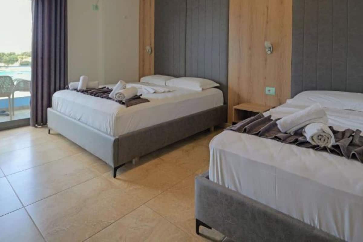 Triple Room, Sea View | Desk, iron/ironing board, free WiFi, bed sheets