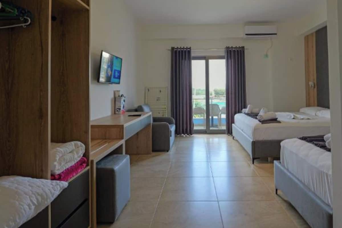Triple Room, Sea View | Desk, iron/ironing board, free WiFi, bed sheets