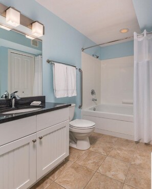 Combined shower/bathtub, hair dryer, towels, soap