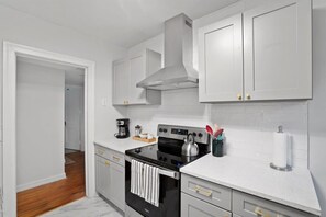 Coffee/tea maker, high chair, cookware/dishes/utensils