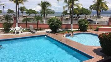 2 outdoor pools, open 8:00 AM to 9:00 PM, free pool cabanas