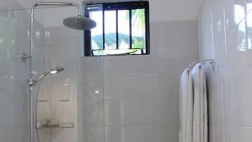 Shower, towels, soap, toilet paper