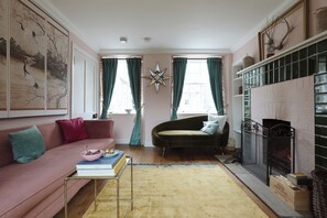 Smart TV, fireplace, books