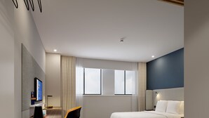 A modern hotel room with a bed, a desk, a chair, and a TV. - Holiday Inn Express Chongqing Airport Zone by IHG (Chongqing)