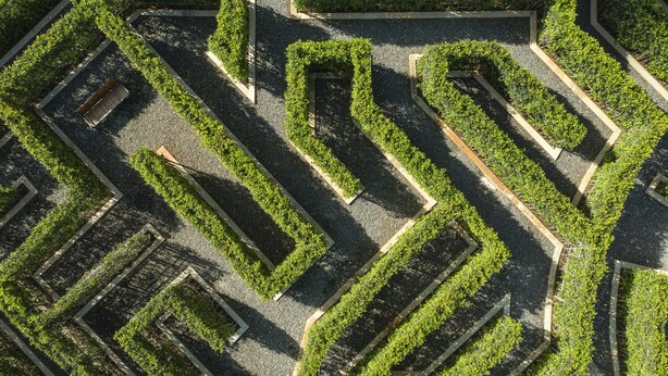 An aerial view of a maze-like garden with geometric pathways and trimmed hedges. - Holiday Inn Resort Ho Tram Beach by IHG (Ho Chi Minh City)