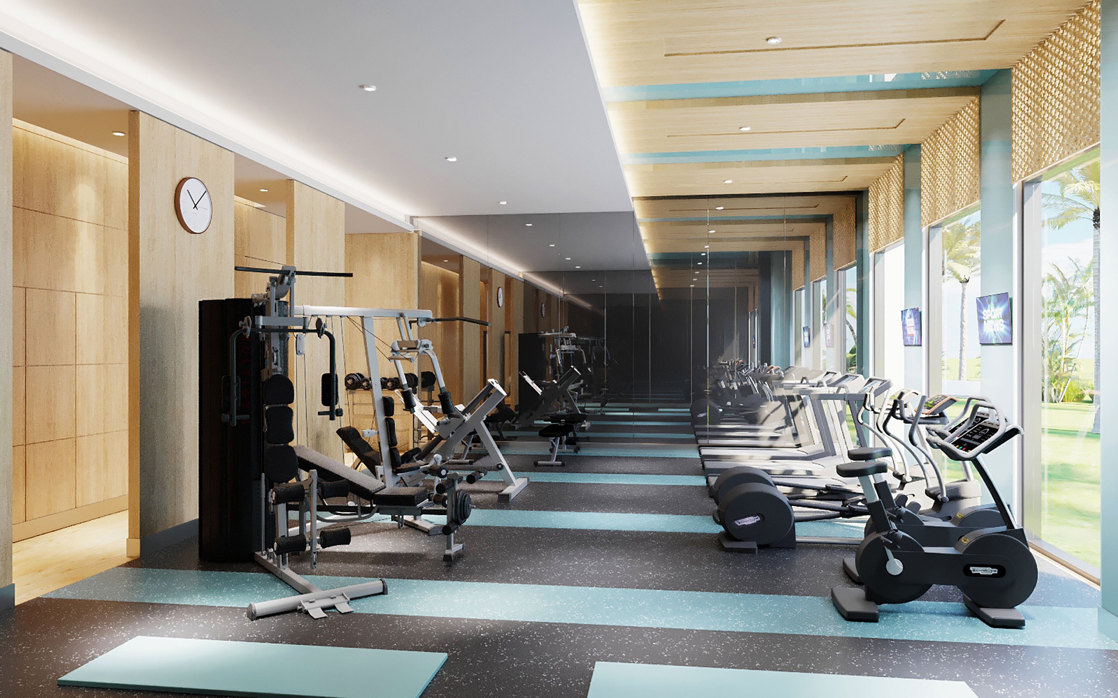 A gym with various exercise equipment, a mirrored wall, and a view of palm trees through large windows.