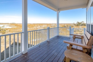 A wooden deck with a white railing overlooking a natural landscape. - Out East Too - Soundfront Home with Amazing Views! Dog Friendly! (North Topsail Beach)