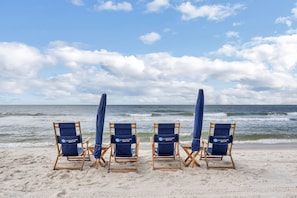 On the beach, sun loungers