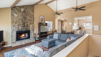 Smart TV, fireplace, books, offices