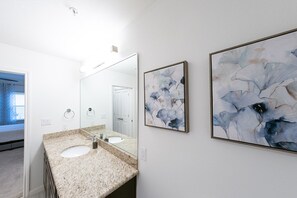 Combined shower/tub, hair dryer, towels, soap