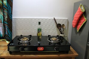 Fridge, electric kettle, toaster, cookware/dishes/utensils