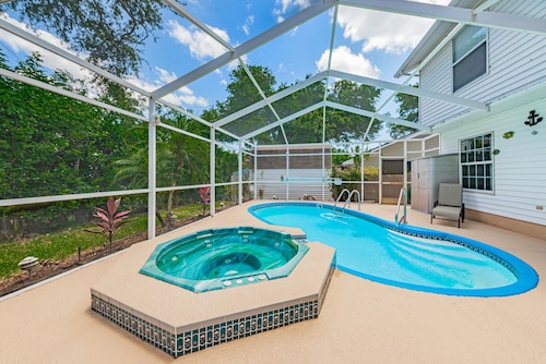 WOW…..beaches just 2 miles away, heated pool, hot tub and room for boat or RV. 