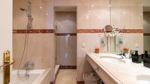 Bathtub, hair dryer, towels