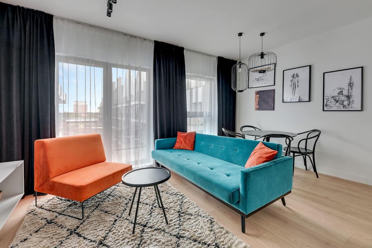 Comfort Apartment, 1 Bedroom, Non Smoking, Balcony | Living area | 40-inch Smart TV with cable channels, TV