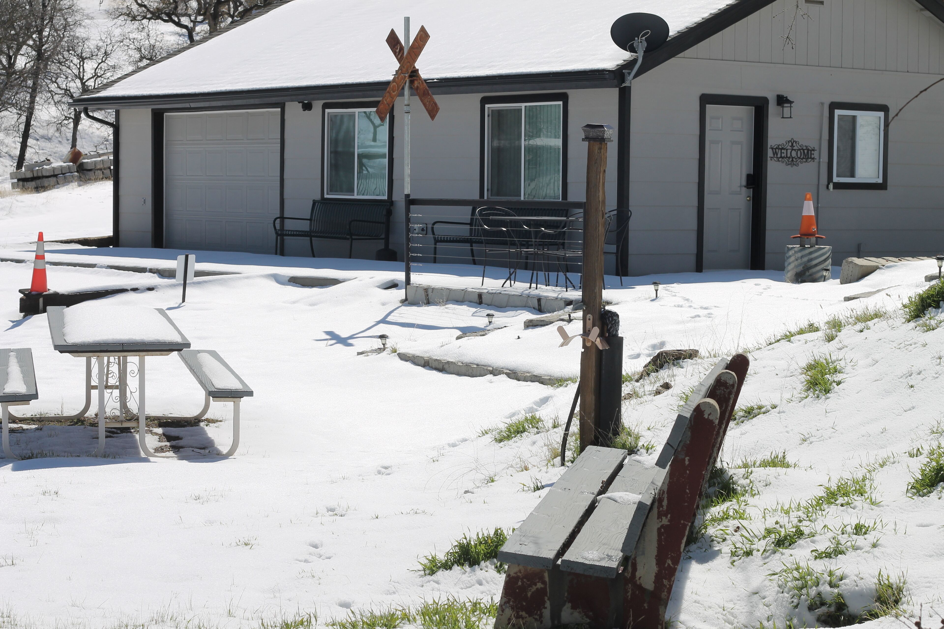 Front of Guest House. Both Rooms facing Tracks with Patio Area.