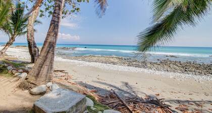 Secluded Treetop Home w/solar panels, Private Balcony, steps from the beach