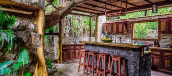 Secluded Treetop Home w/solar panels, Private Balcony, steps from the beach