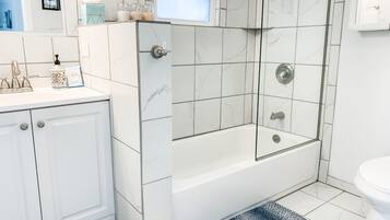 Combined shower/tub, hair dryer