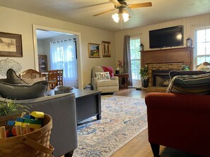 Smart TV, fireplace, DVD player, books